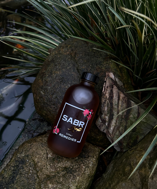 Sabr Remedies Hair Oil bottle with natural ingredients for alopecia treatment